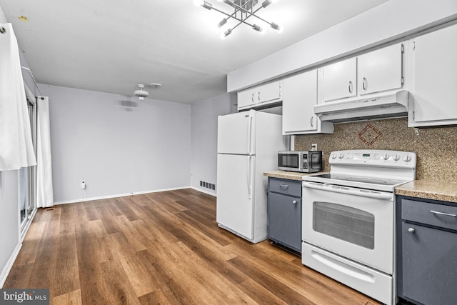 kitchen with white appliances, hardwood / wood-style flooring, white cabinetry, gray cabinetry, and decorative backsplash