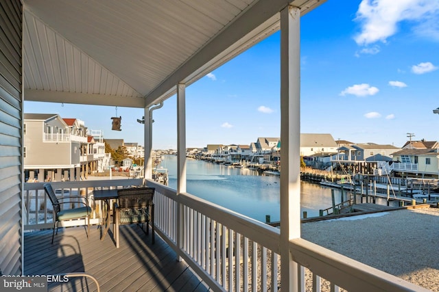 deck featuring a water view