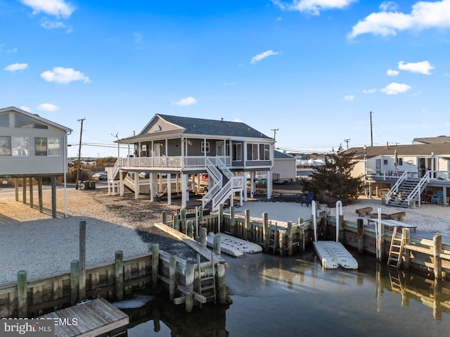 view of dock with a water view