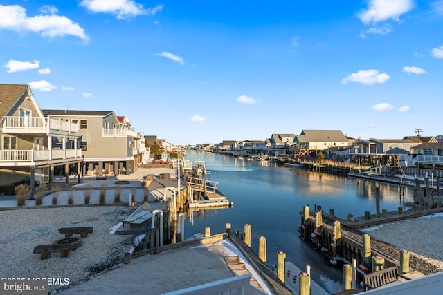 dock area with a water view