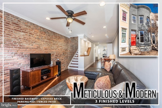 living room with crown molding, dark wood-type flooring, ceiling fan, and brick wall