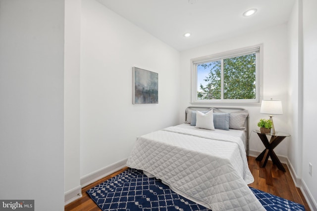 bedroom featuring dark wood-type flooring