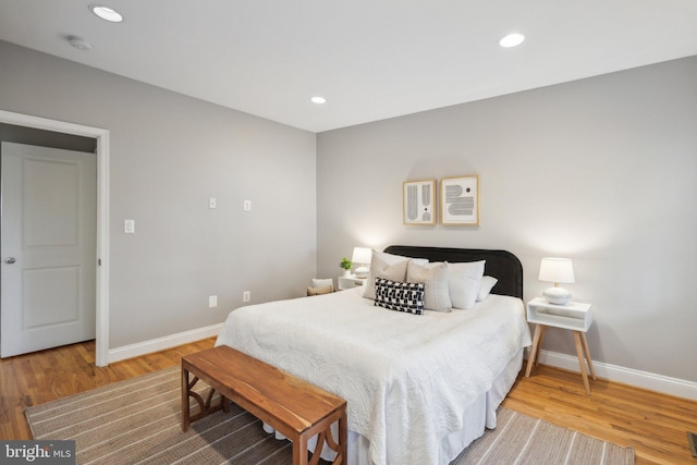 bedroom featuring wood-type flooring