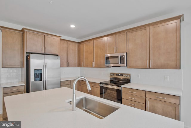 18 Aspen Dr, North East, MD 21901 - kitchen with appliances with stainless steel finishes, a sink, backsplash, light countertops, and recessed lighting