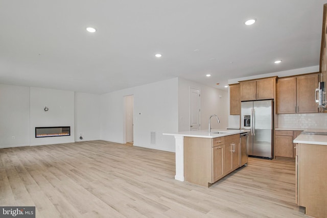 18 Aspen Dr, North East, MD 21901 - kitchen featuring a sink, stainless steel appliances, light wood-style floors, light countertops, and recessed lighting