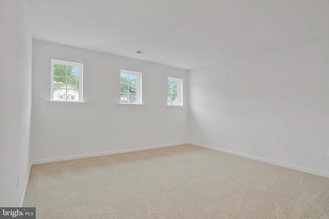 18 Aspen Dr, North East, MD 21901 - carpeted spare room with plenty of natural light and baseboards