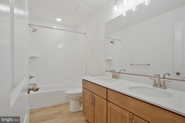 18 Aspen Dr, North East, MD 21901 - bathroom with double vanity, shower / bath combination, toilet, wood finished floors, and recessed lighting