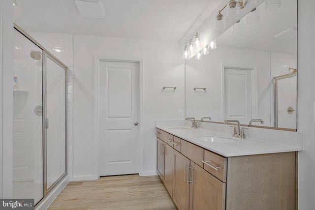 18 Aspen Dr, North East, MD 21901 - bathroom featuring a shower stall, wood finished floors, and double vanity