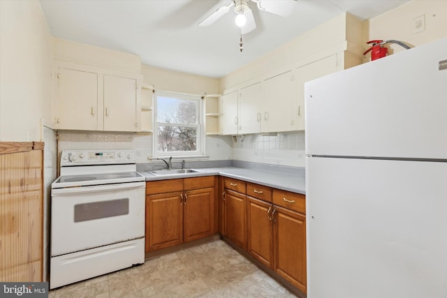 kitchen with tasteful backsplash, white appliances, ceiling fan, and sink