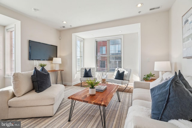 living room with light hardwood / wood-style floors