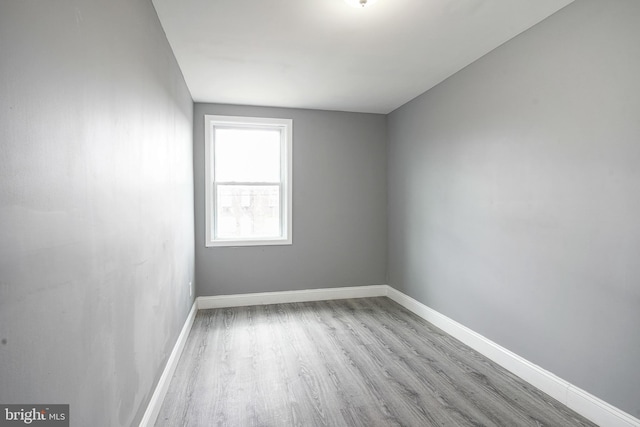 unfurnished room featuring light wood-type flooring