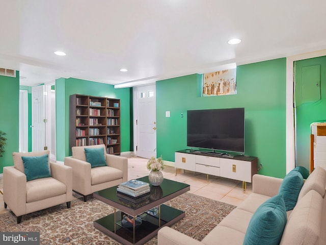 living room with light tile patterned floors