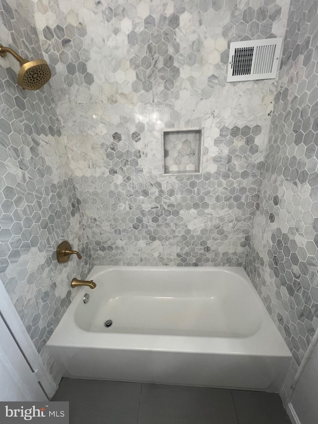 bathroom with tile patterned flooring