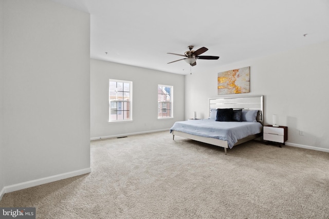 bedroom featuring ceiling fan and carpet floors