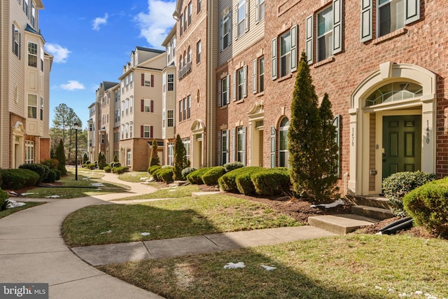 surrounding community featuring a lawn