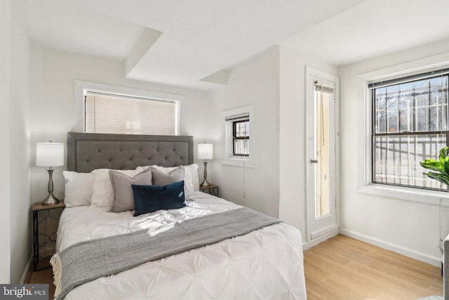 bedroom with light hardwood / wood-style floors