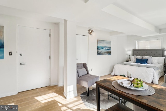 bedroom with light hardwood / wood-style floors