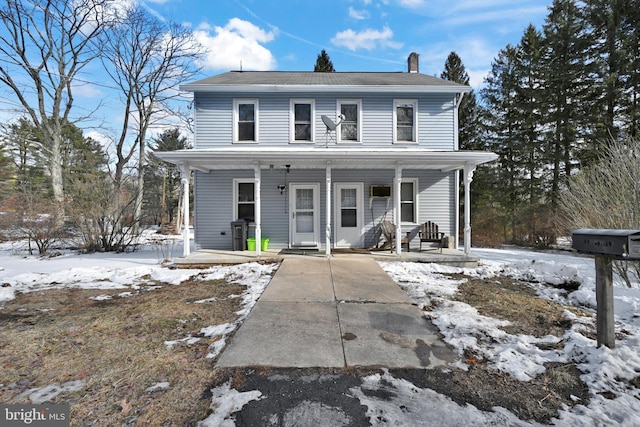 view of property with a porch