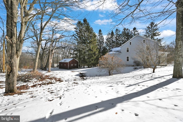 view of yard layered in snow