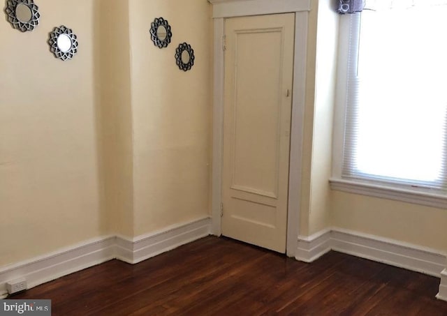 interior space with dark hardwood / wood-style floors