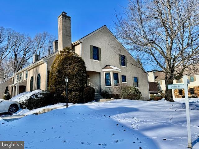 view of snow covered property