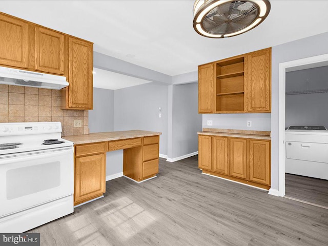 kitchen with washer / clothes dryer, backsplash, electric range, and light hardwood / wood-style floors