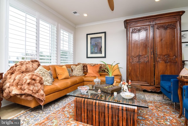 living room with crown molding