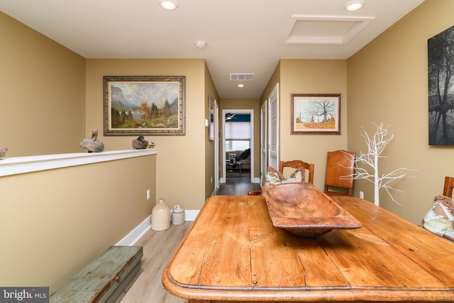 dining area featuring light wood-type flooring