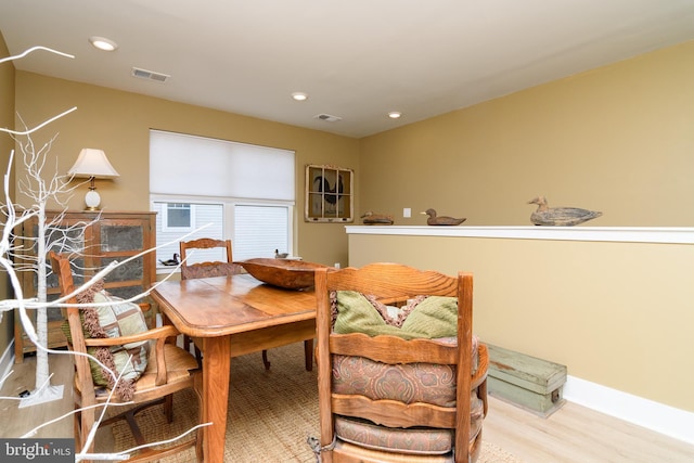 dining area with light wood-type flooring