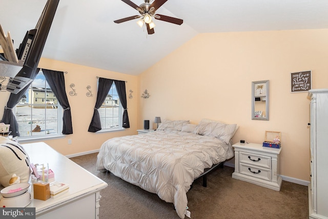 bedroom featuring ceiling fan, lofted ceiling, and dark carpet