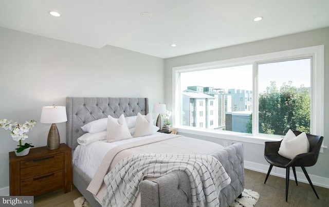 bedroom featuring wood-type flooring