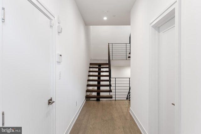 hall with light hardwood / wood-style flooring