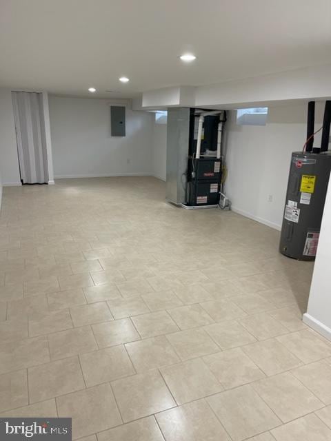 basement featuring heating unit, electric panel, and electric water heater