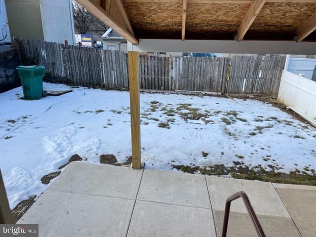 view of yard covered in snow