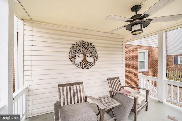 exterior space with a ceiling fan