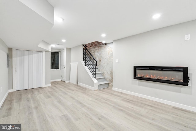 basement with light wood-type flooring