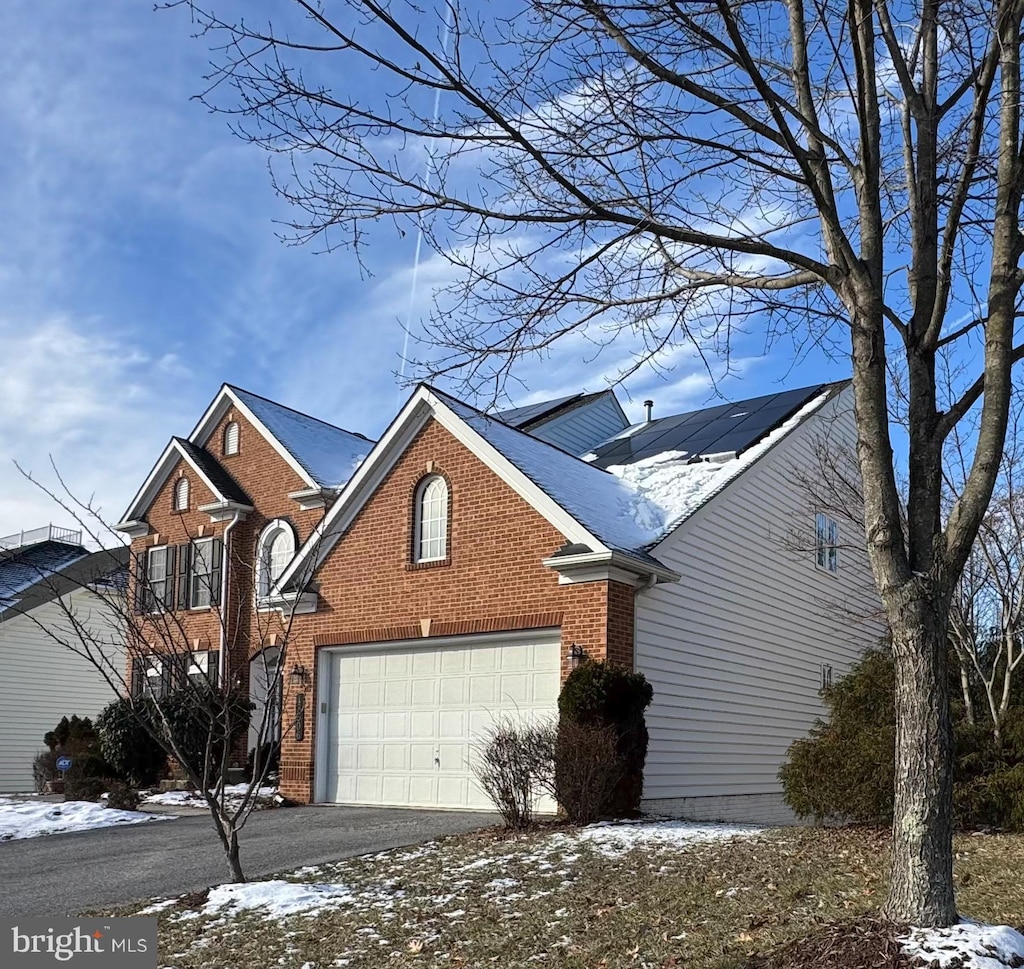 view of front property with a garage