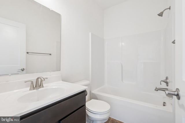 full bathroom featuring vanity, toilet, and tub / shower combination