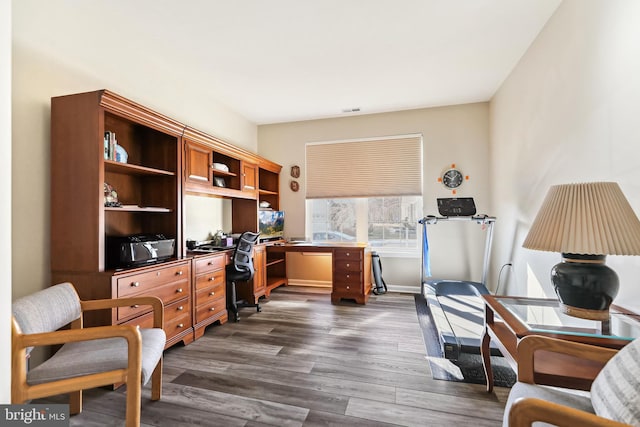 office space with dark hardwood / wood-style floors