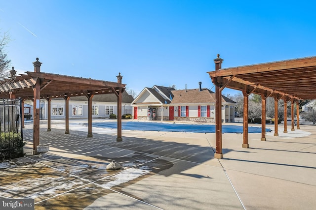 view of swimming pool featuring a pergola