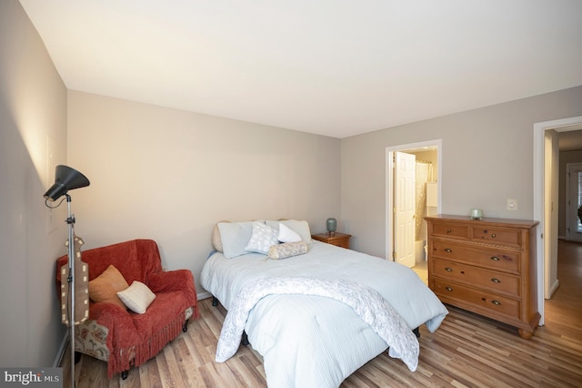 bedroom with light wood-type flooring