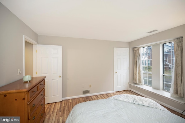 bedroom featuring light wood-type flooring