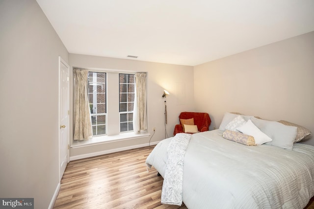 bedroom featuring light hardwood / wood-style flooring