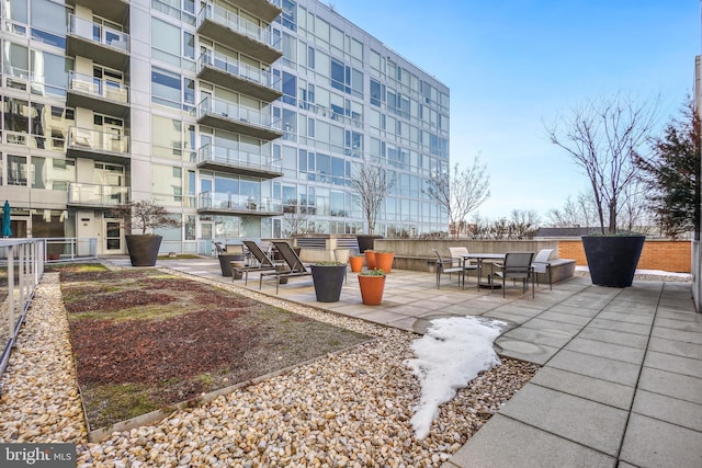 view of home's community featuring a patio