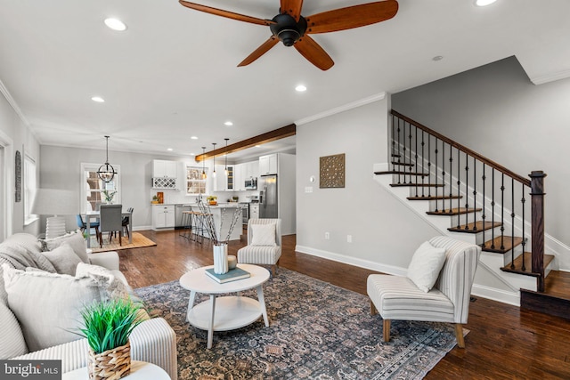 living room featuring ornamental molding, dark hardwood / wood-style floors, and ceiling fan