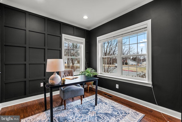 home office featuring crown molding and dark hardwood / wood-style flooring