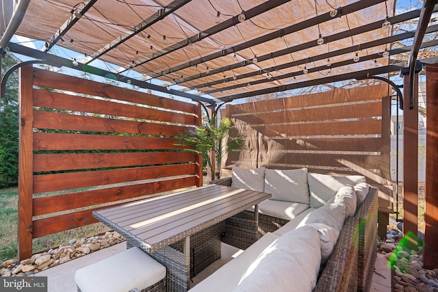 view of patio / terrace featuring an outdoor living space and a pergola