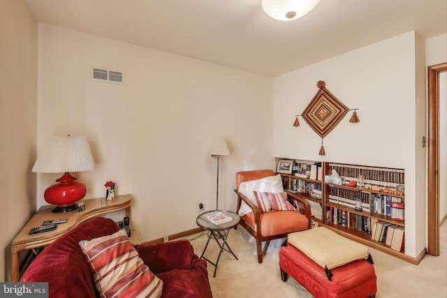 sitting room with light carpet