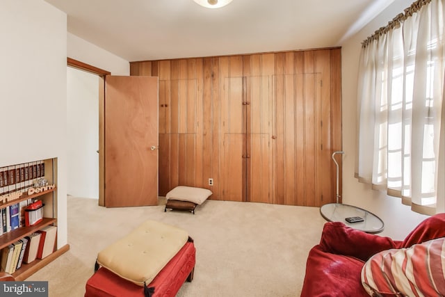 living area with carpet flooring