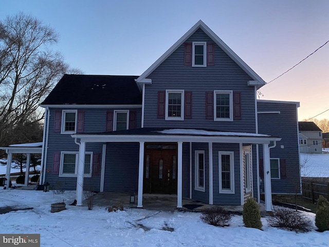 front of property featuring covered porch